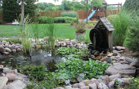 Custom built water feature; pond with rocks in Homer Glen, Illinois.
