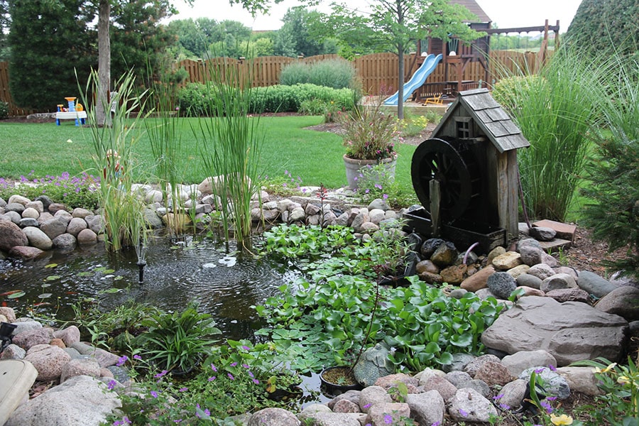 Custom built water feature; pond with rocks in Homer Glen, Illinois.