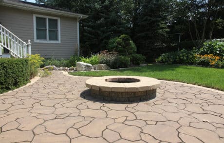 Custom built brick firepit and patio in Naperville Illinois.