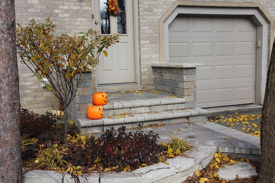Paver stone walkway and steps with Halloween decorations in Homer Glen Illinois.