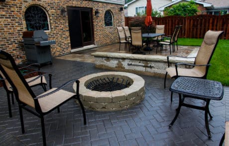 brick patio with brick fire pit. Hardscaping done by bret-mar landscaping and hardscaping