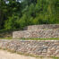 beautiful multi-layer retaining wall built from rock and stone done in homer glen illinois