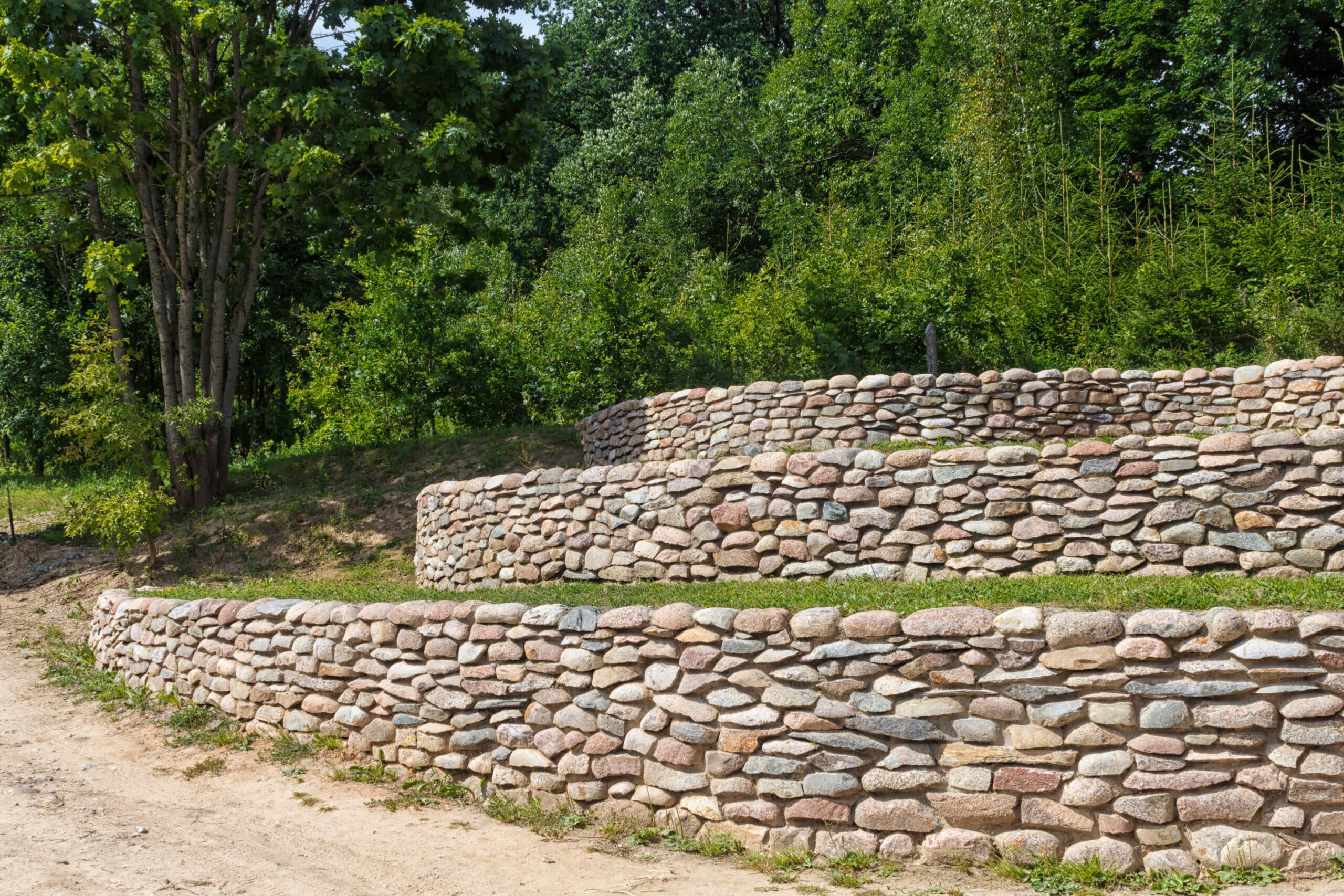 beautiful multi-layer retaining wall built from rock and stone done in homer glen illinois