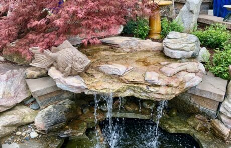 Outdoor water fall water features with pond done by bret-mar landscaping