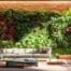 a stylish urban balcony showcases innovative vertical garden features, combining sleek planters and minimalist decor to maximize space and create a vibrant, modern retreat.