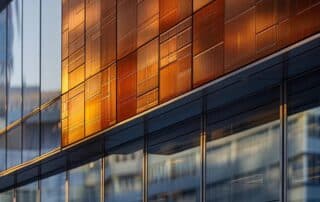 a sleek, modern urban landscape showcases a variety of rust-resistant metal border styles, prominently displayed against a backdrop of contemporary architecture, emphasizing durability and aesthetic appeal.